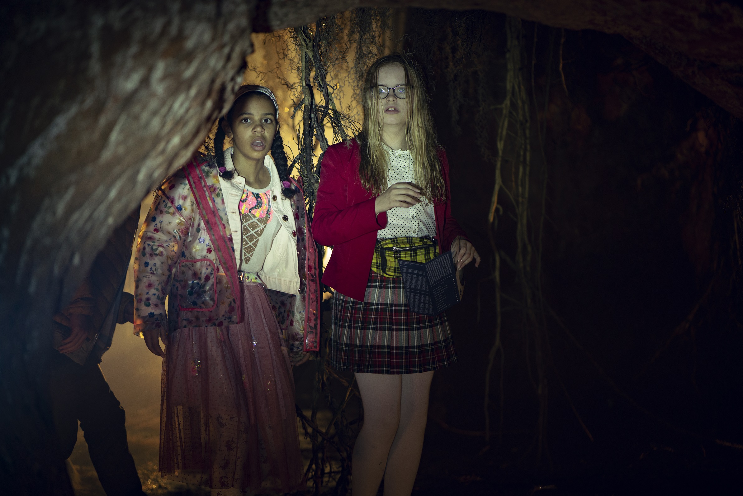 The Last Bus: Carys John as Bethan and Marlie Morrelle as Chelsea in Episode 2 of The Last Bus, filmed at Bristol's Redcliffe Caves (credit James Pardon/Netflix ©2021)